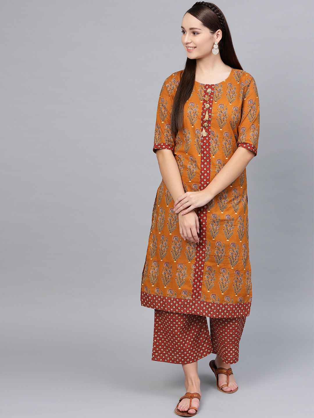 

Myshka Women Mustard Brown & Rust Red Printed Straight Kurta with Palazzos