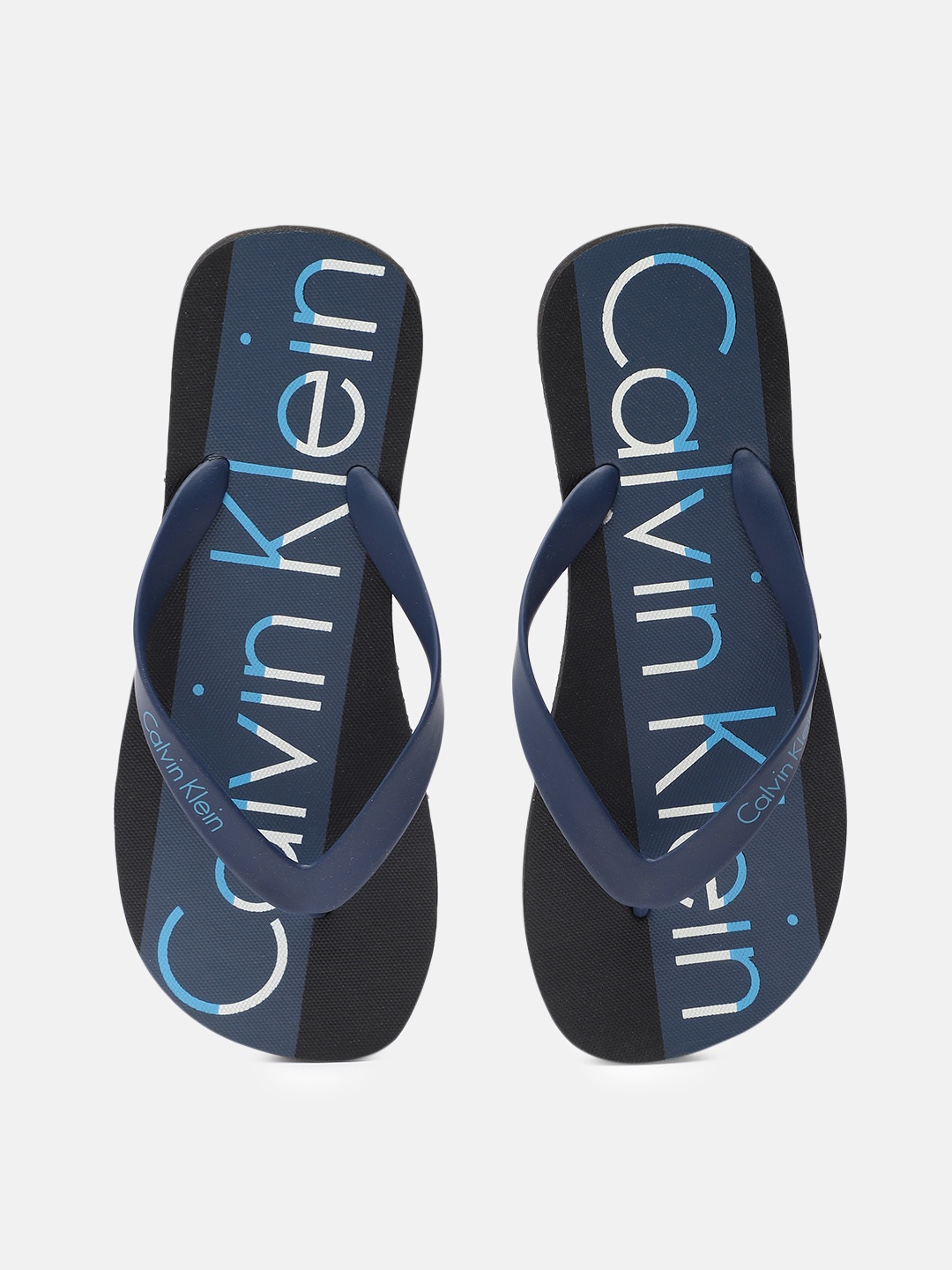 

Calvin Klein Men Brand Logo Printed Thong Flip-Flops, Navy blue