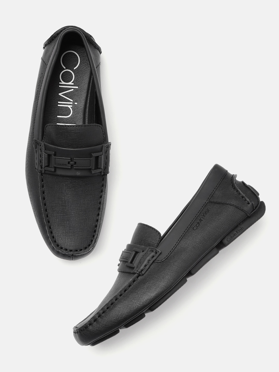 

Calvin Klein Men Black Textured Leather Loafers