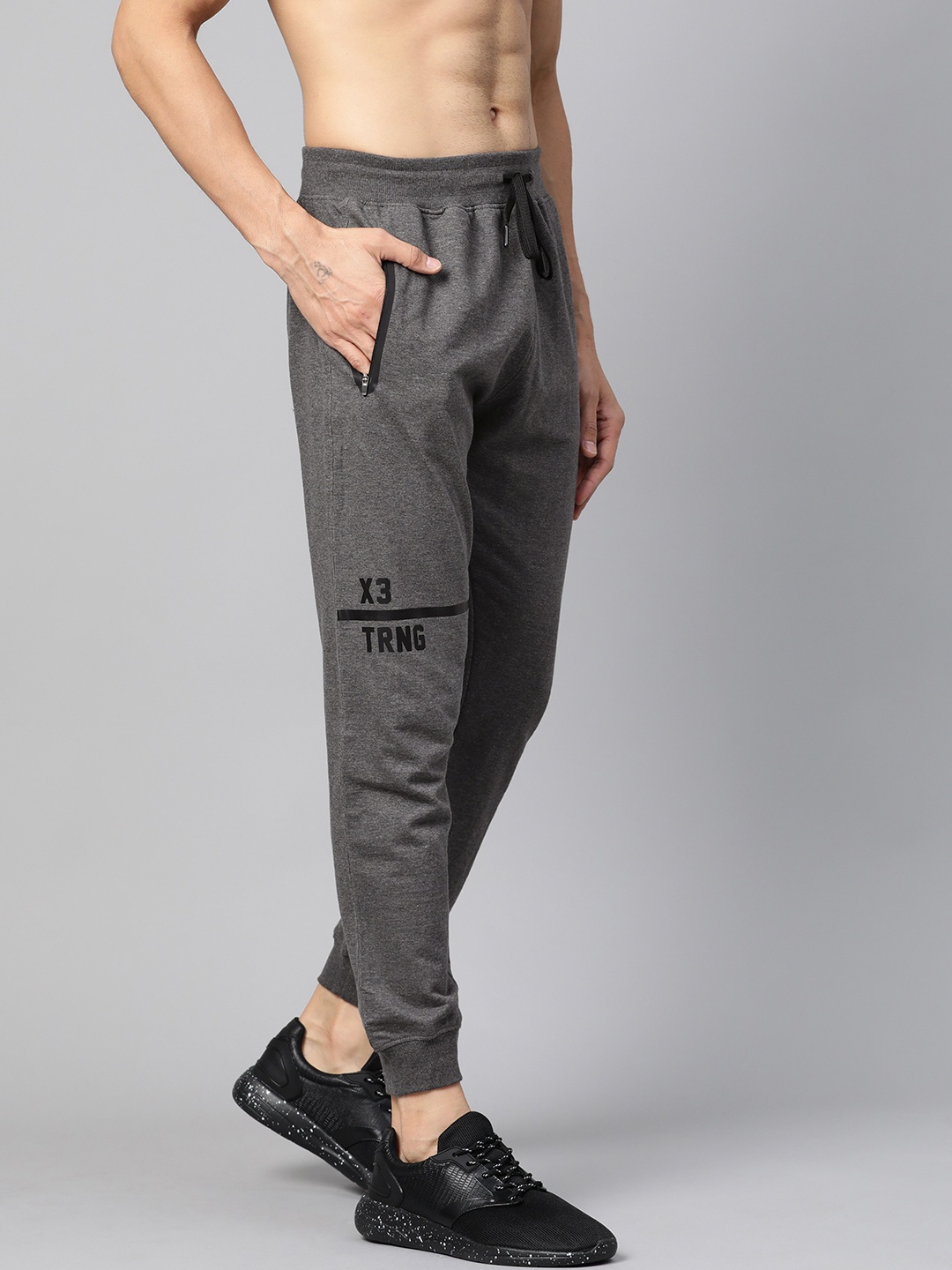 

HRX by Hrithik Roshan Men Anthra Melange Solid Slim Fit Rapid Dry Training Joggers, Charcoal