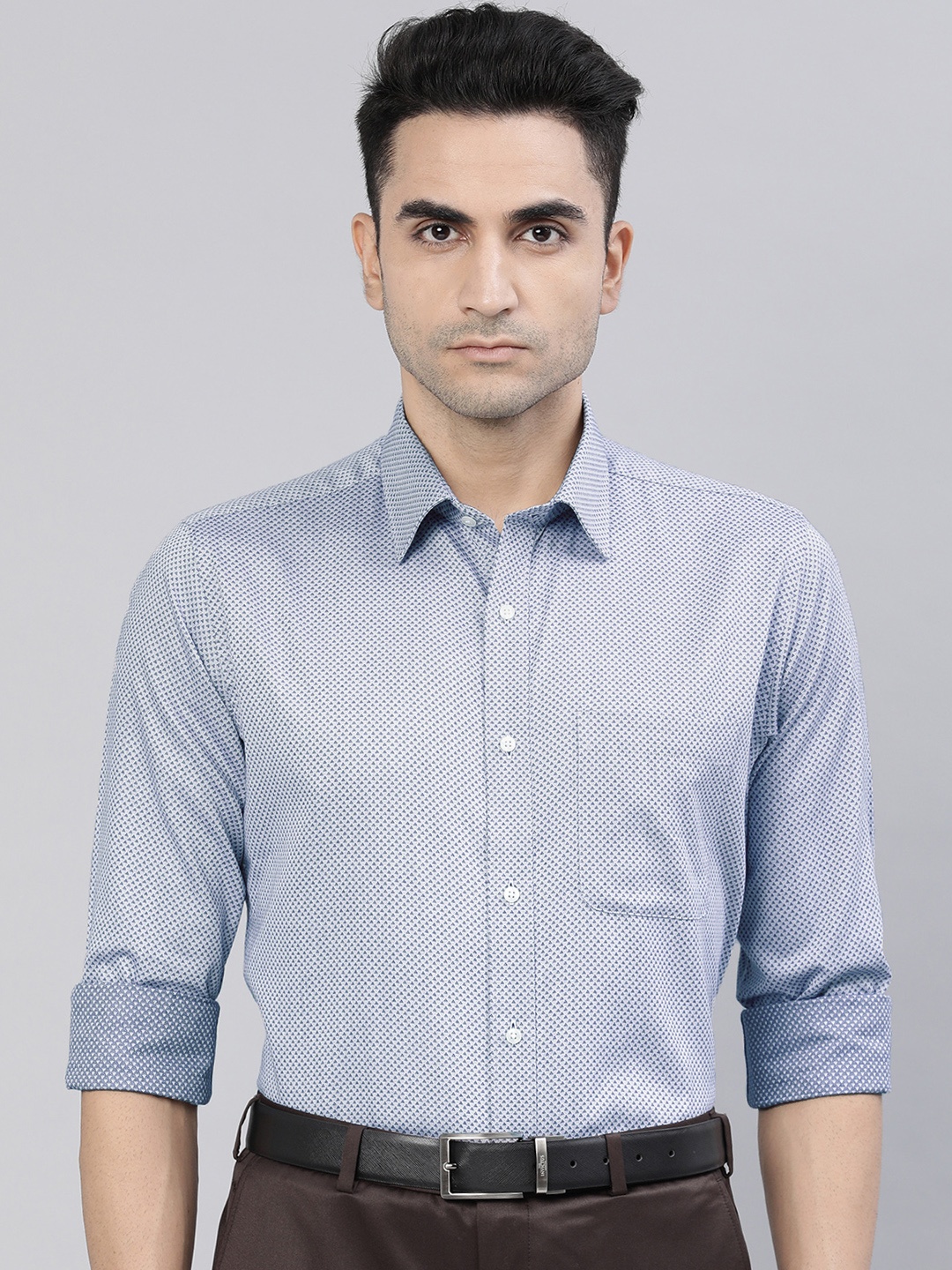 

Raymond Men Blue Slim Fit Self Design Formal Shirt