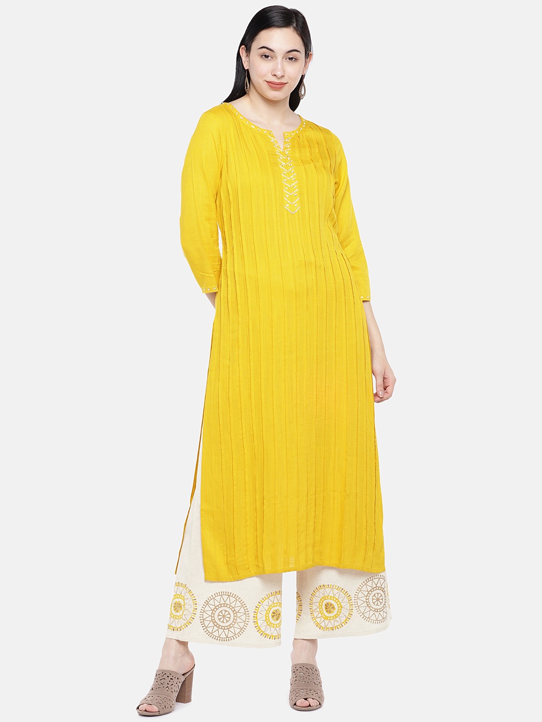 

Prakrti Women Yellow & Off-White Solid Kurta with Palazzos