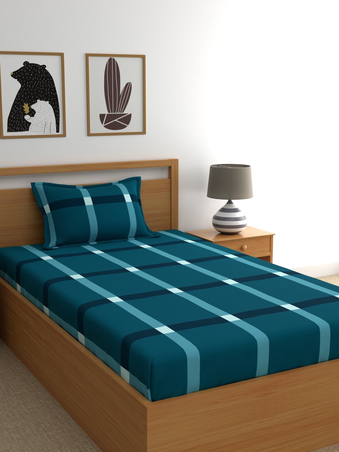 

Home Ecstasy Blue Geometric 140 TC Cotton 1 Single Bedsheet with 1 Pillow Cover