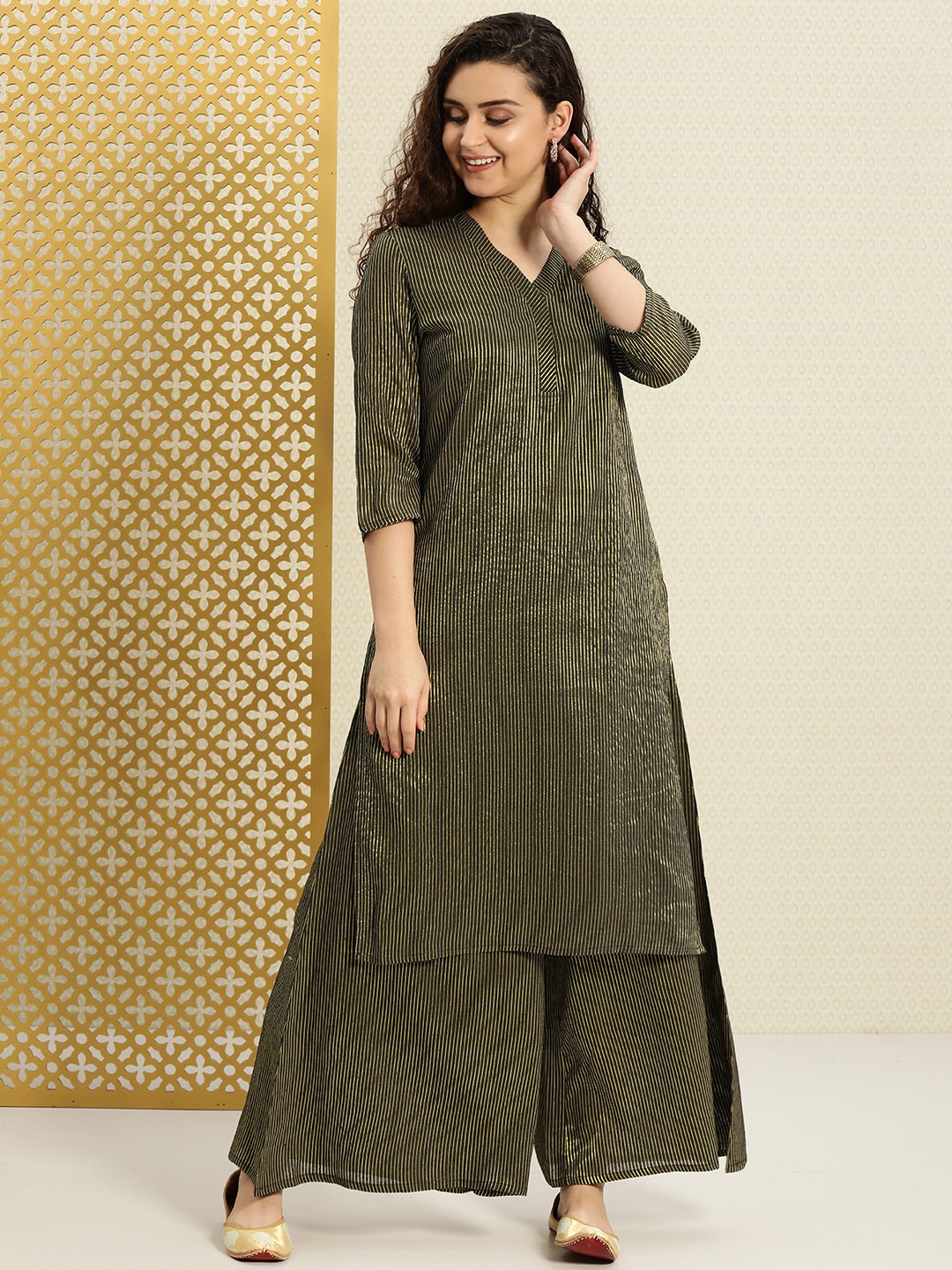 

House of Pataudi Women Black & Gold-Toned Striped Flared Palazzos