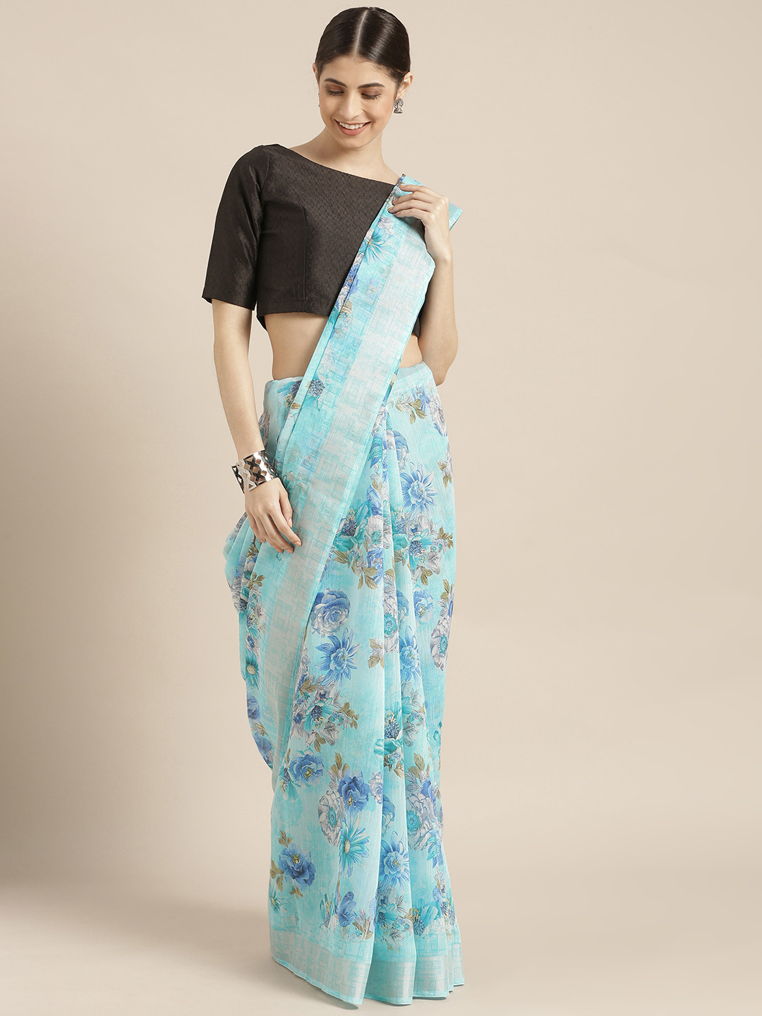 

Mitera Turquoise Blue Printed Cotton Blend Saree