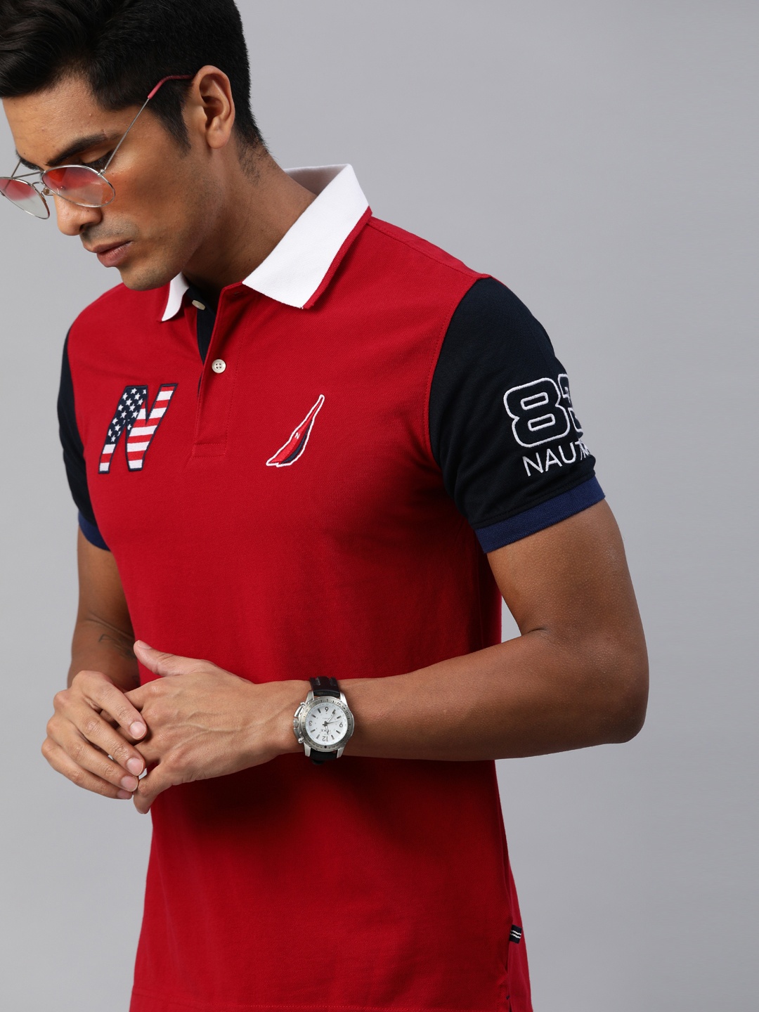 

Nautica Men Red Solid Polo Collar T-shirt with Embroidered Detail