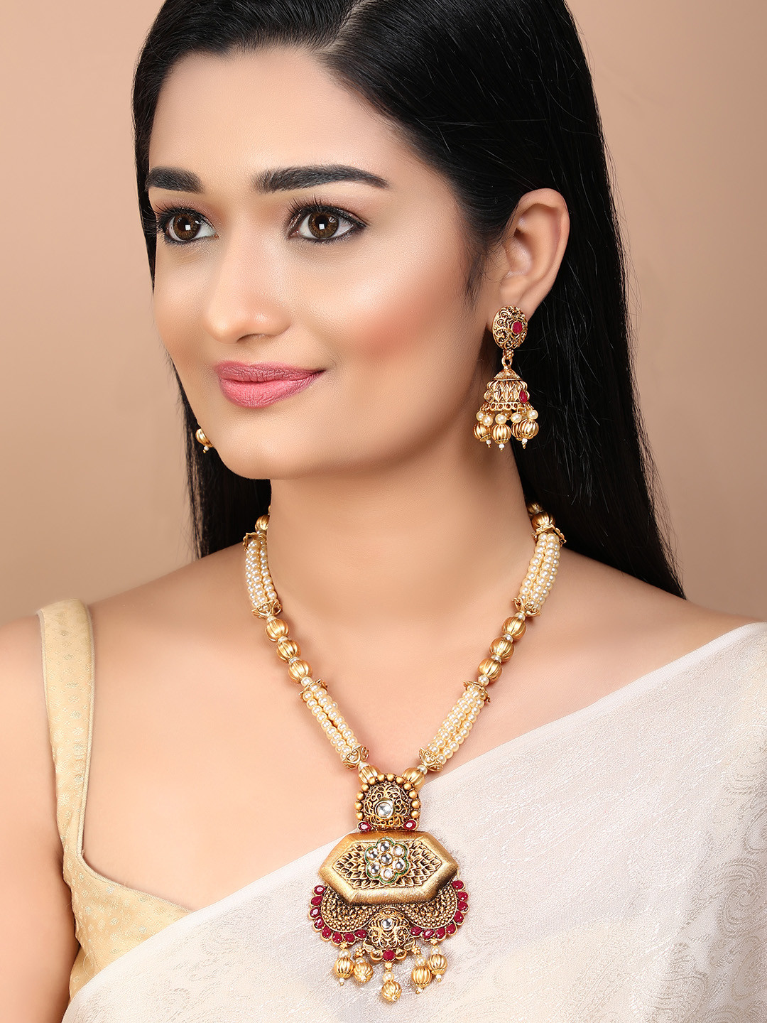 

Rubans Maroon & Off-White Gold-Plated Artificial Stone & Bead Embellished Antique Jewellery Set