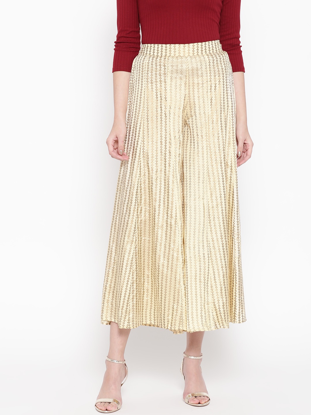 

Be Indi Women Cream-Coloured & Golden Printed Flared Palazzos