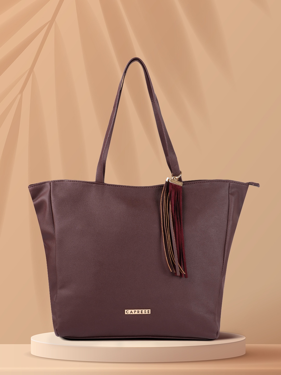 

Caprese Maroon Solid Shoulder Bag