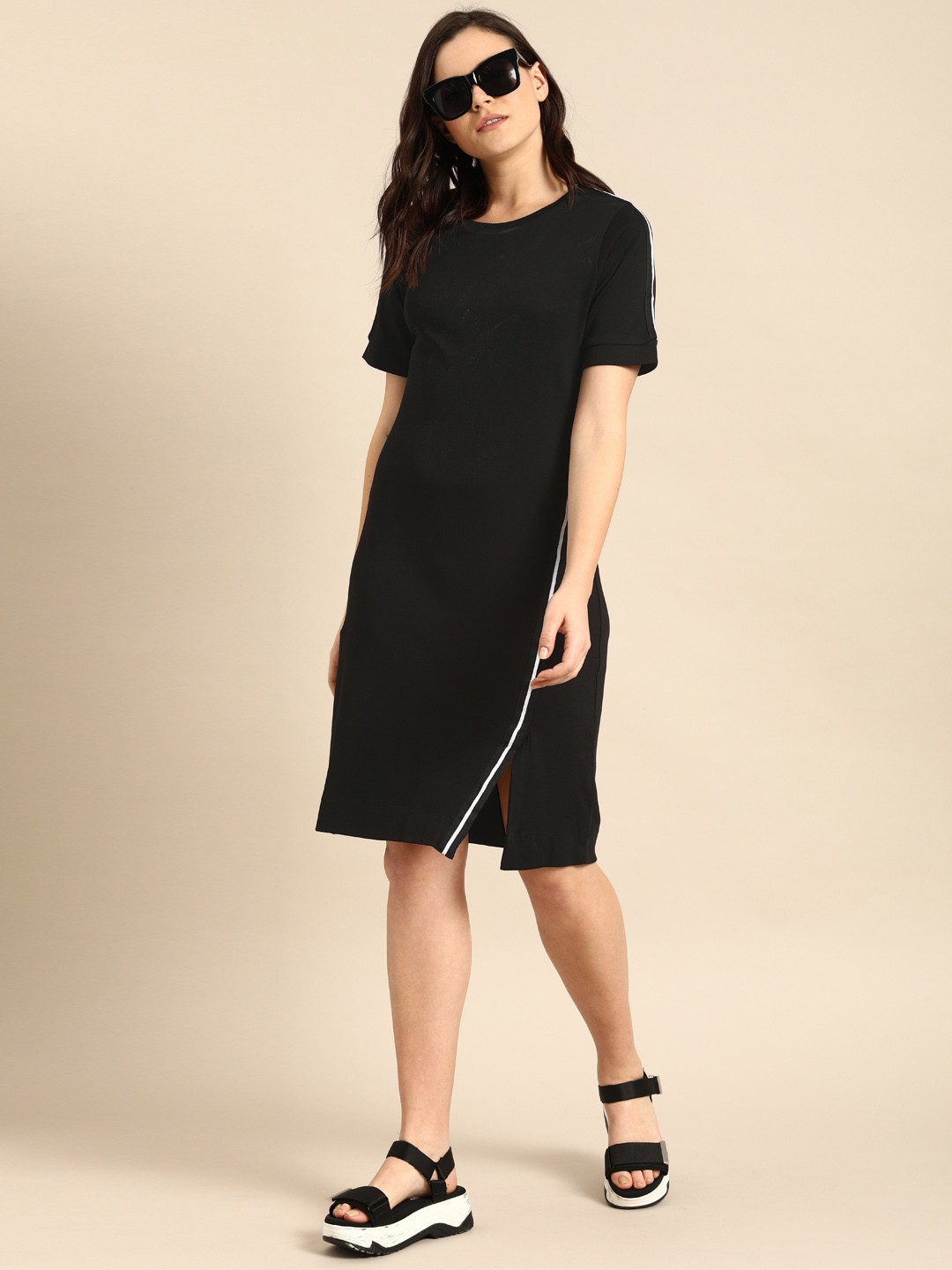 

ether Women Black Solid T-shirt Dress with Side Slit