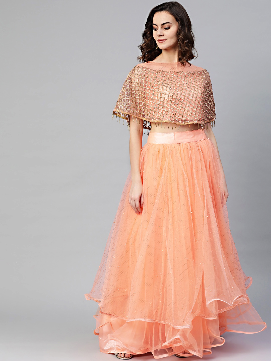 

Chhabra 555 Peach-Coloured Foil Print Made to Measure Lehenga & Choli