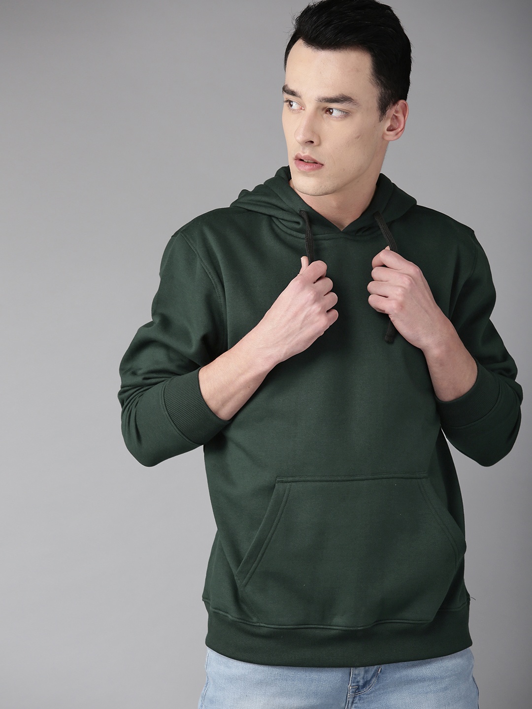 

The Roadster Lifestyle Co Men Green Solid Hooded Sweatshirt