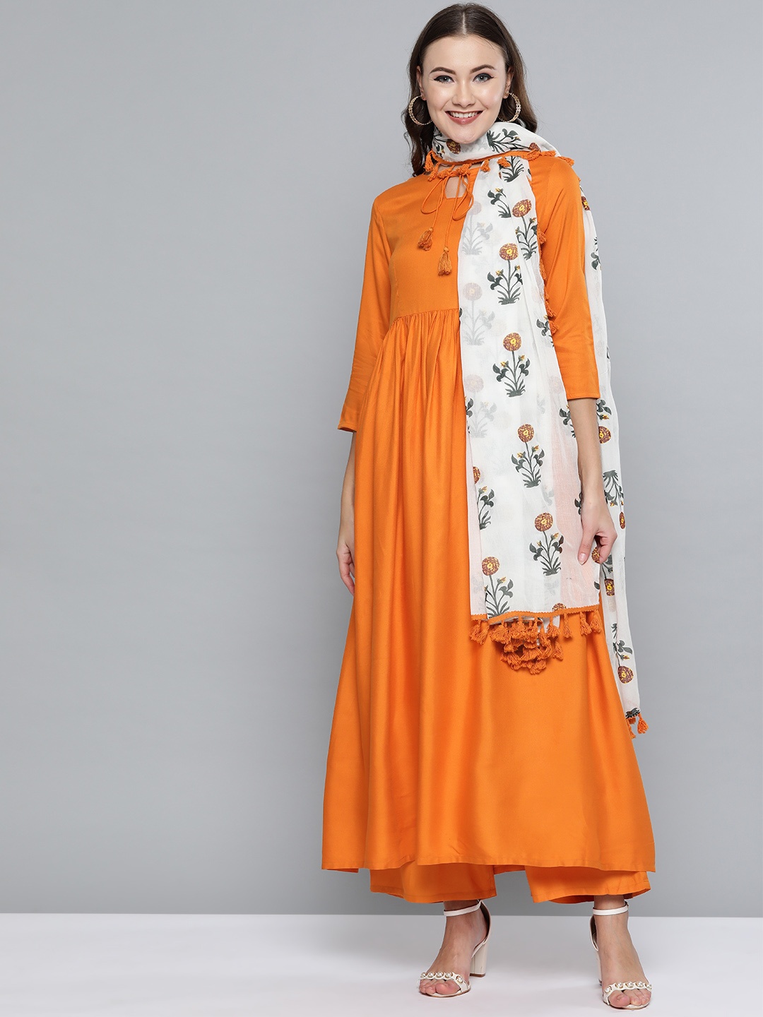 

HERE&NOW Women Orange Solid Kurta with Palazzos & Dupatta