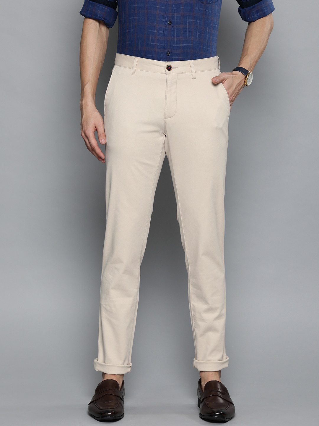 

Louis Philippe Sport Men Beige Self Design Slim Fit Regular Trousers