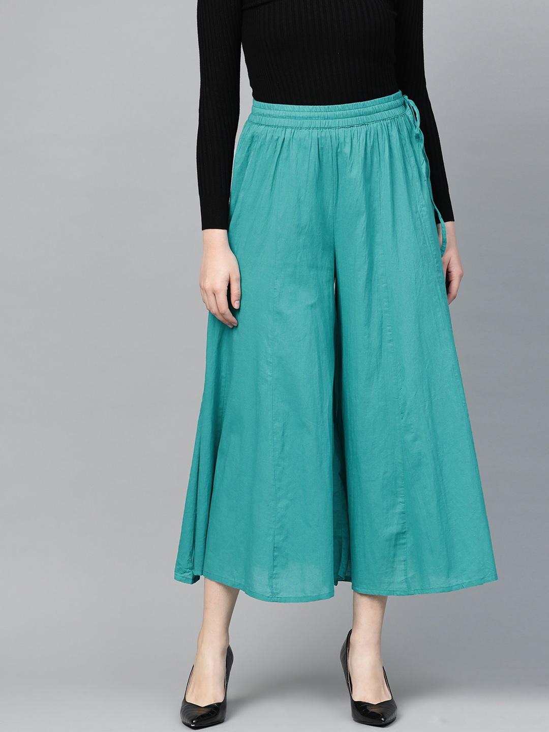 

Varanga Women Green Solid Cropped Flared Palazzos