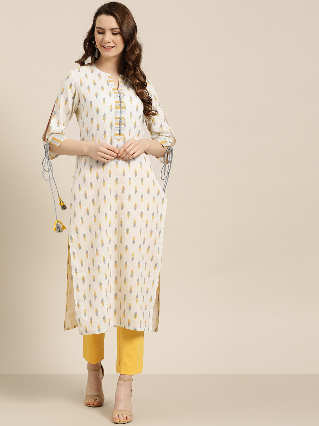 

Jaipur Kurti Women Off-White & Yellow Ikat Printed Straight Kurta