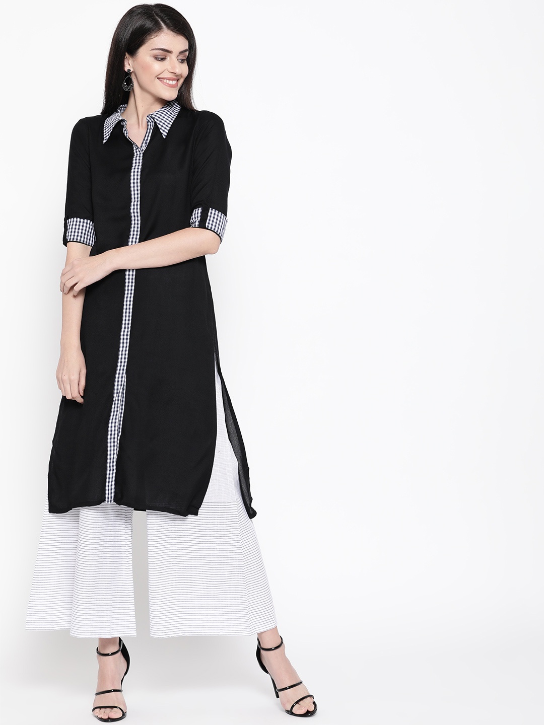 

Raano Women Black Solid Straight Kurta