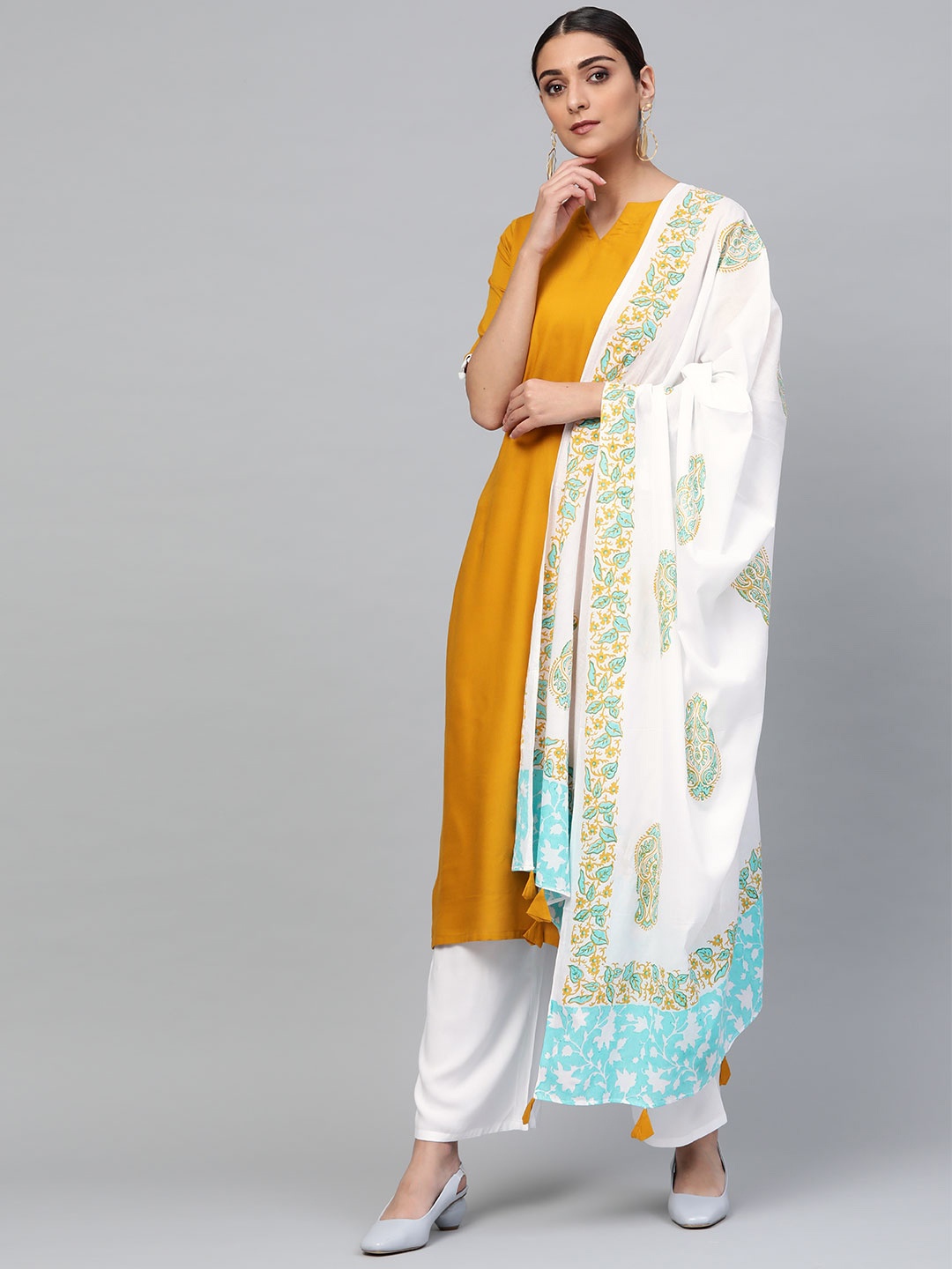 

Libas Women Mustard Yellow & White Solid Kurta with Palazzos & Dupatta