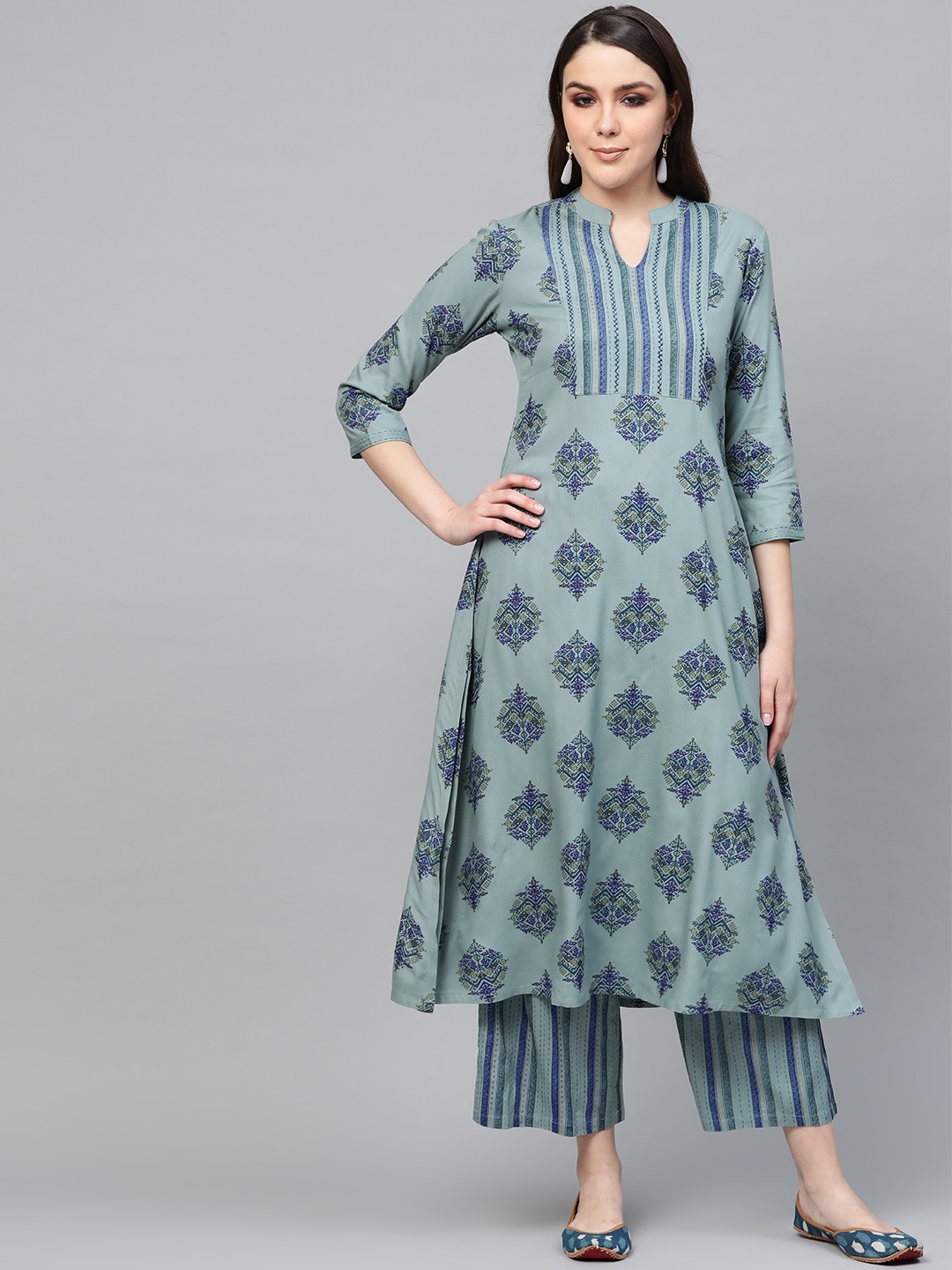 

Libas Women Blue & Golden Printed Kurta with Palazzos