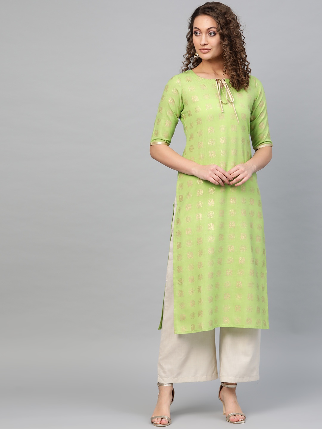 

Libas Women Green & Golden Printed Straight Kurta