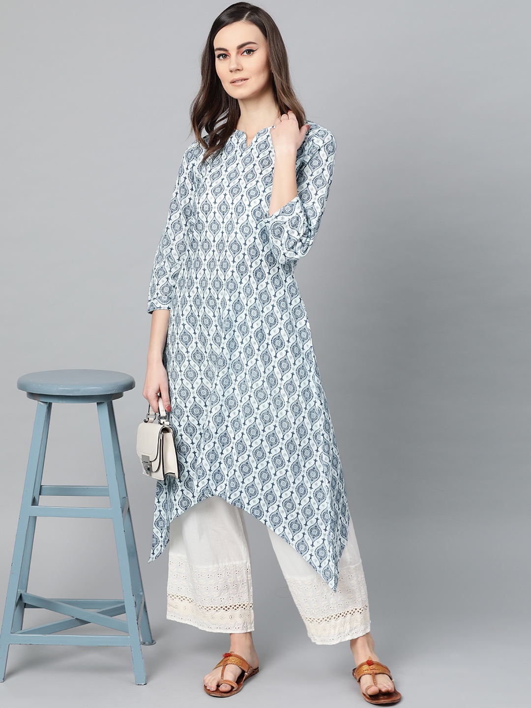 

Popnetic Women Off-White & Navy Blue Block Printed A-Line Kurta