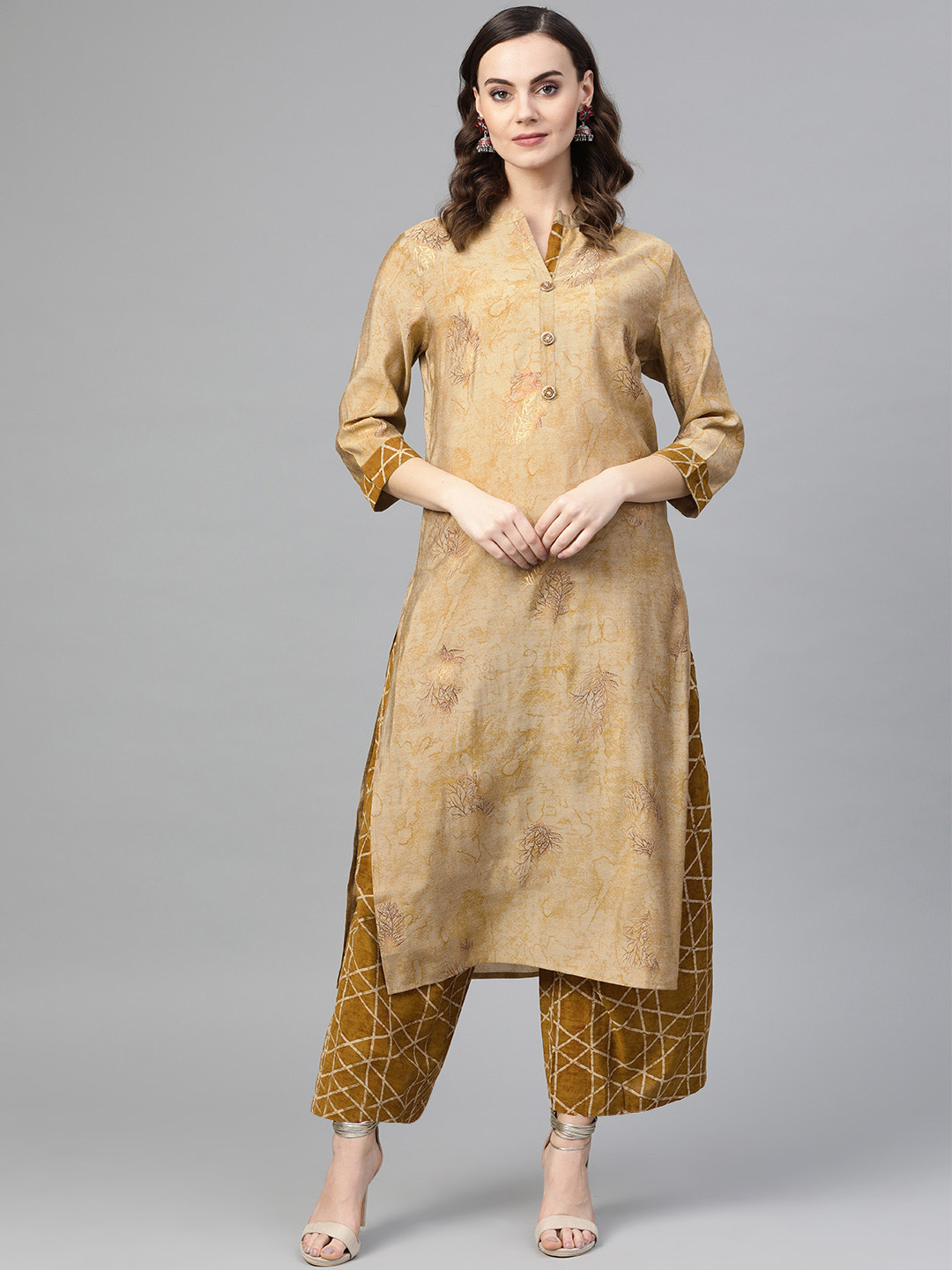 

Inddus Women Beige & Mustard Brown Foil Print Kurta with Palazzos