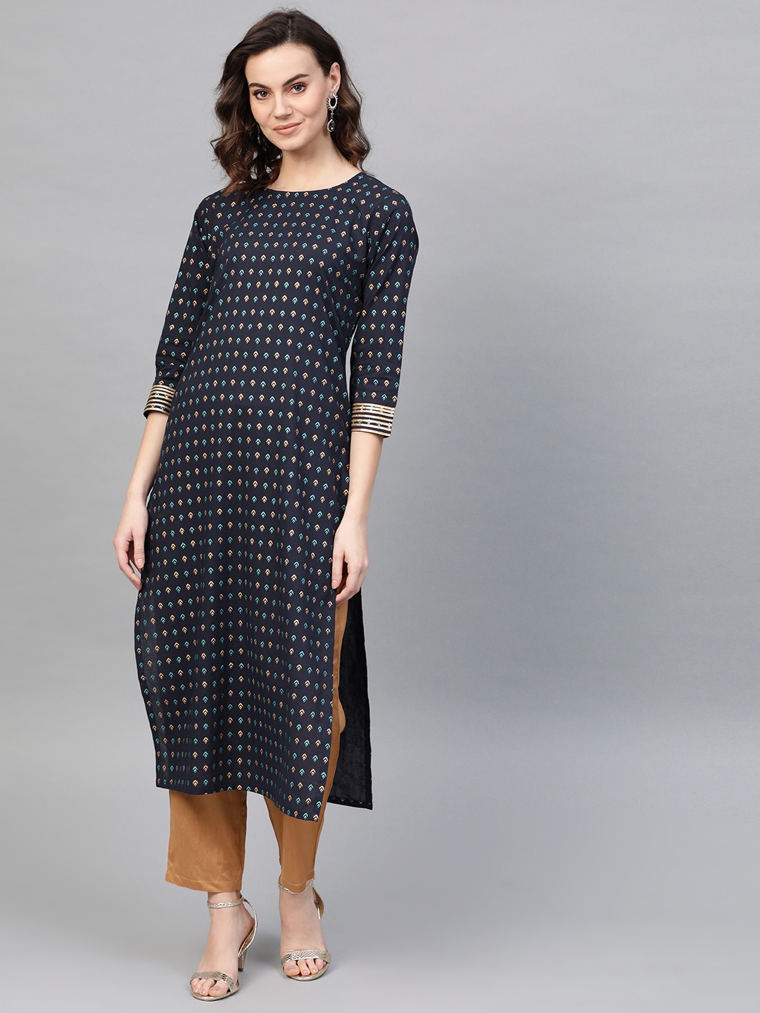 

Indo Era Women Navy Blue & Beige Foil Printed Kurta with Trousers