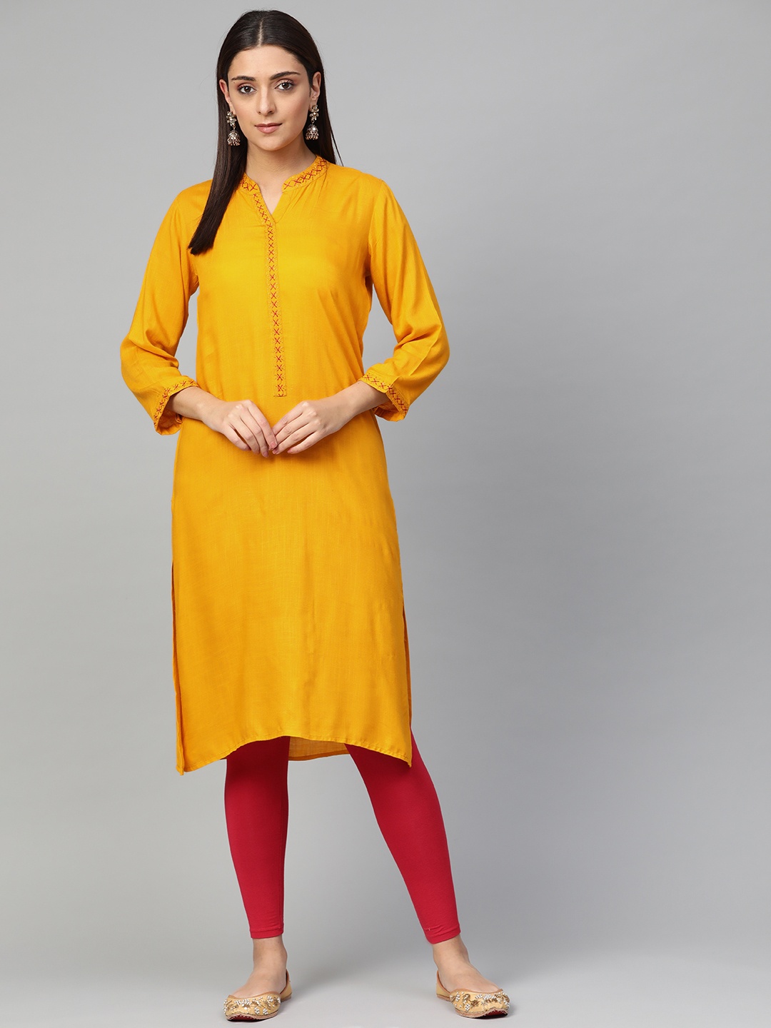 

Jompers Women Yellow Solid Straight Kurta, Mustard