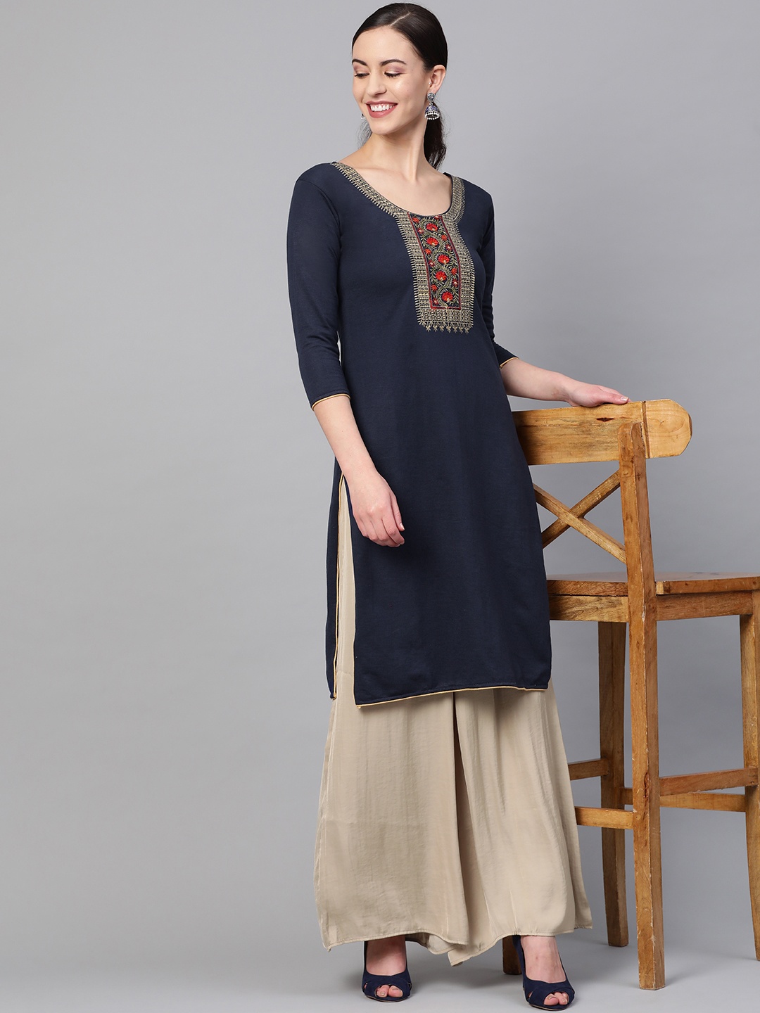 

Saadgi Women Navy Blue Yoke Design Handloom Straight Winter Kurta