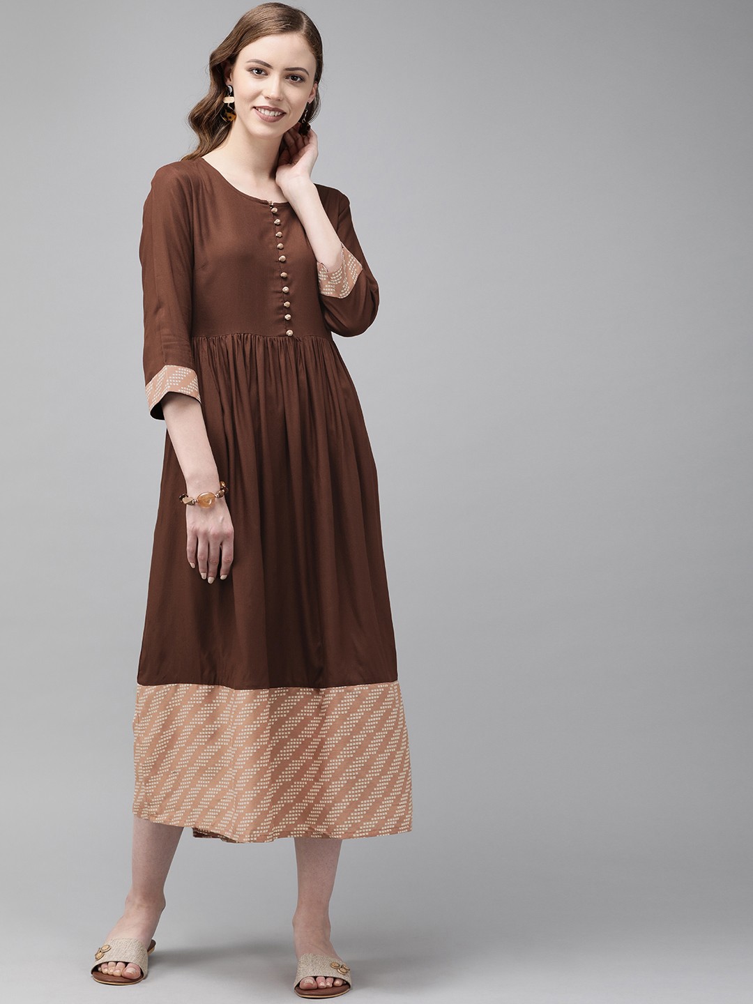 

Anouk Women Brown Solid A-Line Kurta