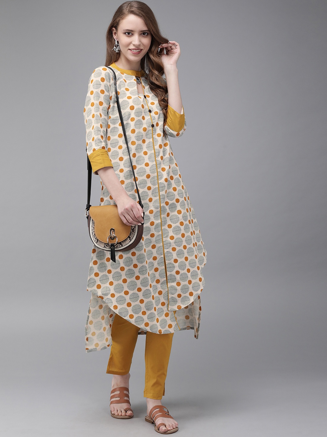 

Anouk Women Beige & Mustard Yellow Printed Kurta with Trousers