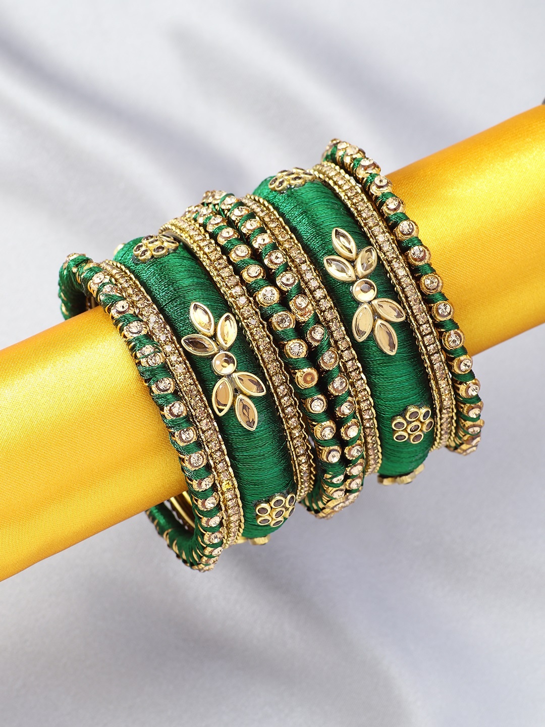 

Peora Set Of 10 Green Gold-Plated Designer Silk Thread Bangles