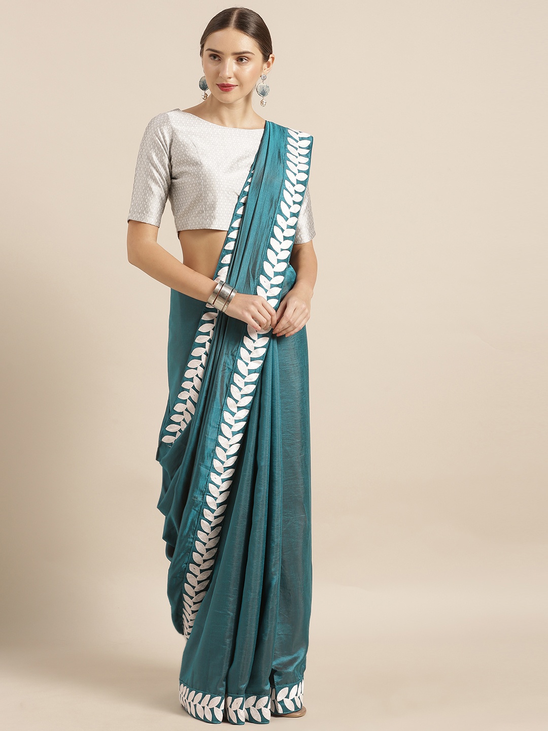 

MIRCHI FASHION Teal Blue Solid Poly Georgette Saree