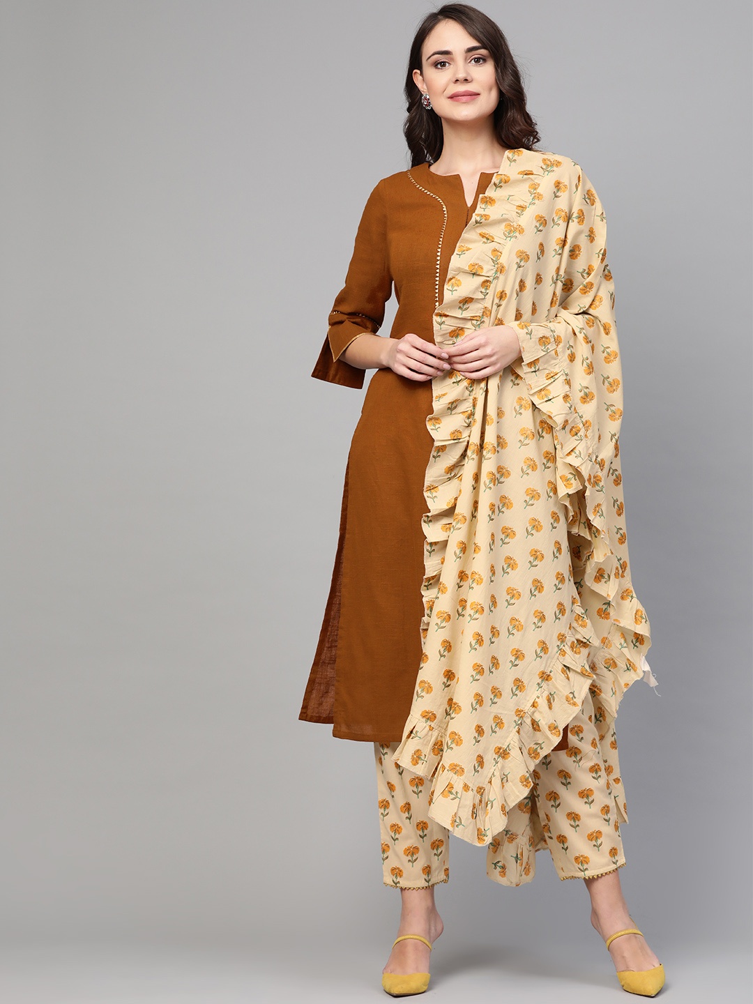 

Idalia Women Brown & Beige Solid Kurta with Trousers & Dupatta