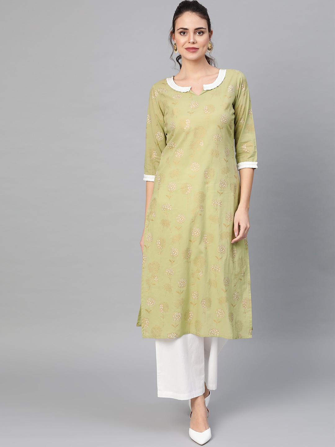 

Idalia Women Green & White Printed Kurta with Palazzos