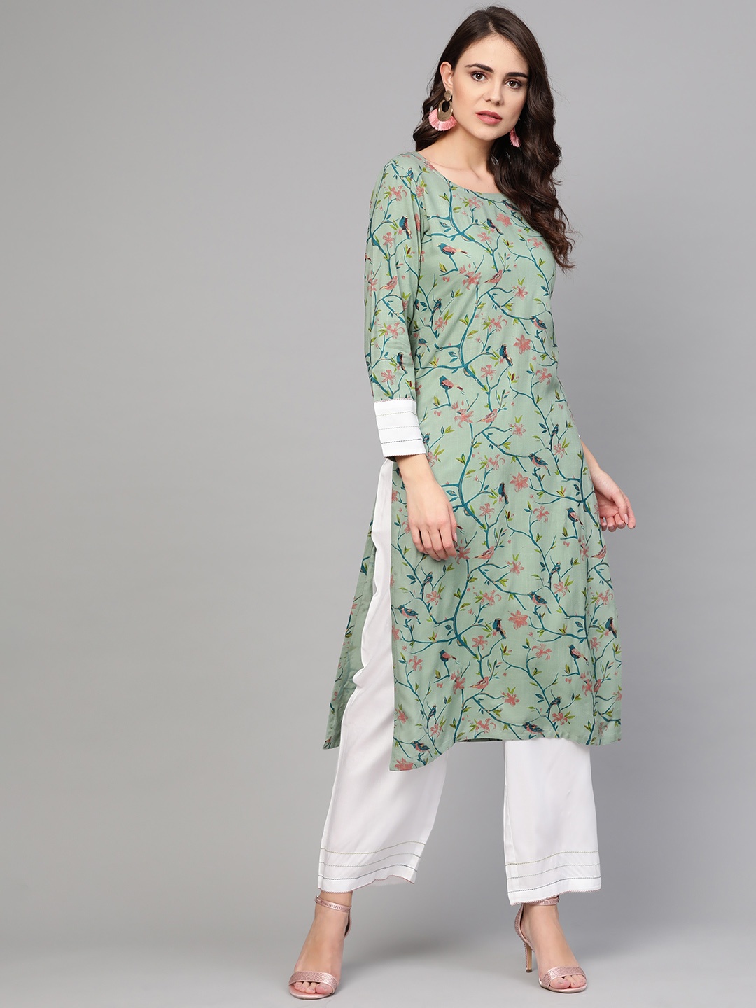 

Idalia Women Green & White Printed Kurta with Palazzos