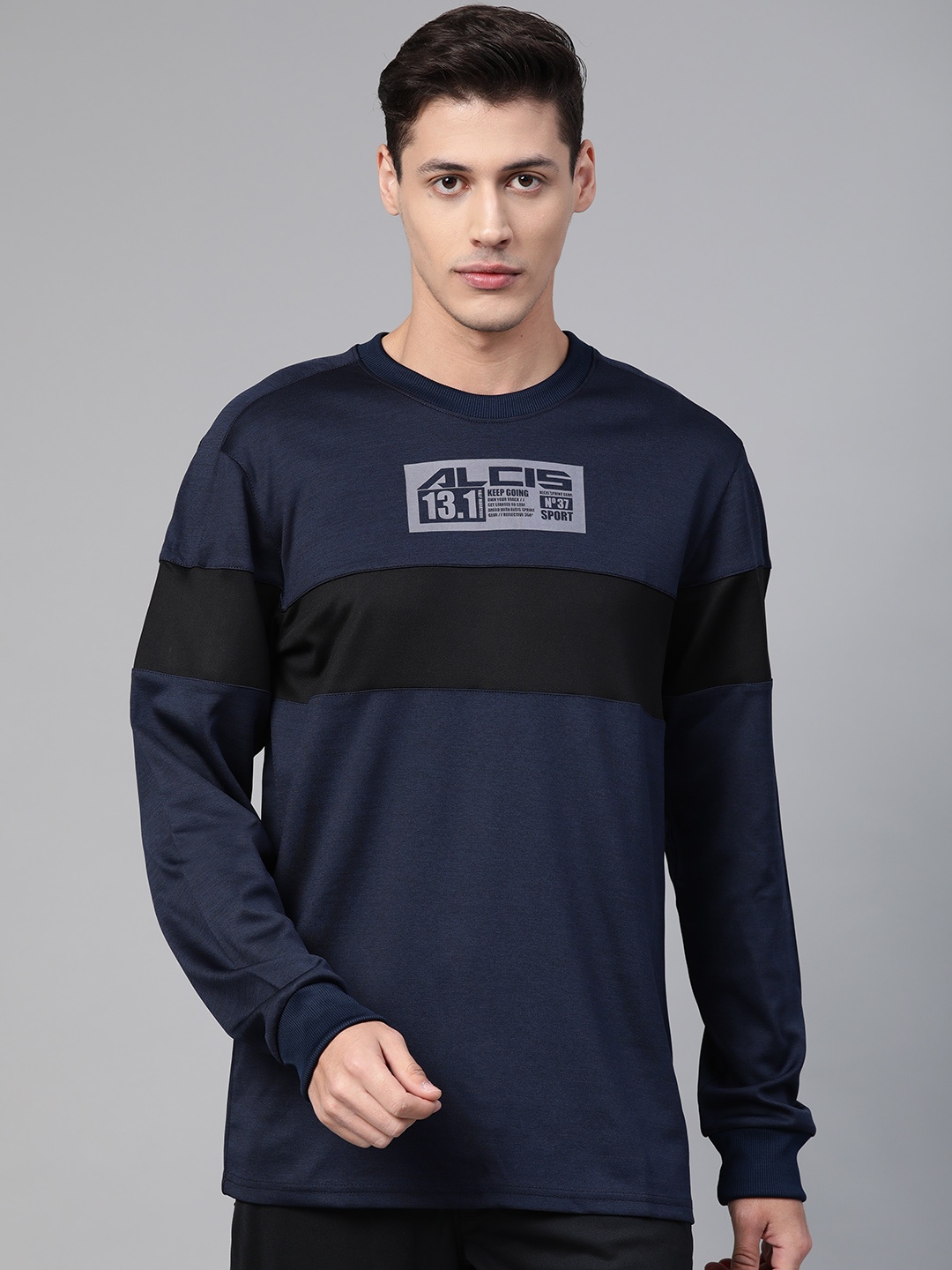 

Alcis Men Navy Blue & Black Colourblocked Running Sweatshirt