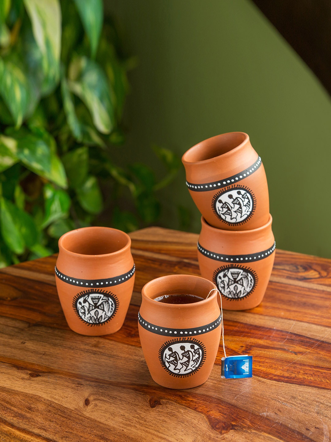 

ExclusiveLane Brown & Black Set of 4 Hand-Painted Terracotta Coffee & Tea Kulladhs