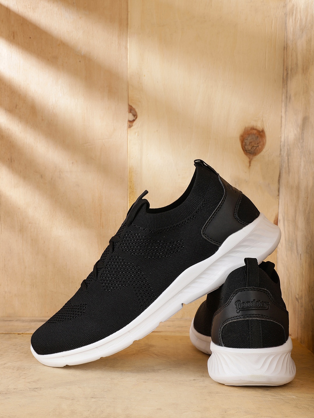 

The Roadster Lifestyle Co Men Black Solid Sneakers