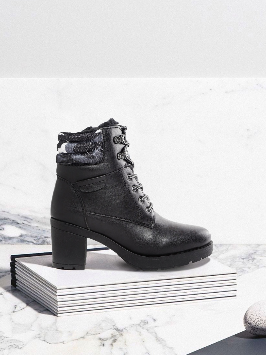 

The Roadster Lifestyle Co Women Black Solid Mid-Top Heeled Boots