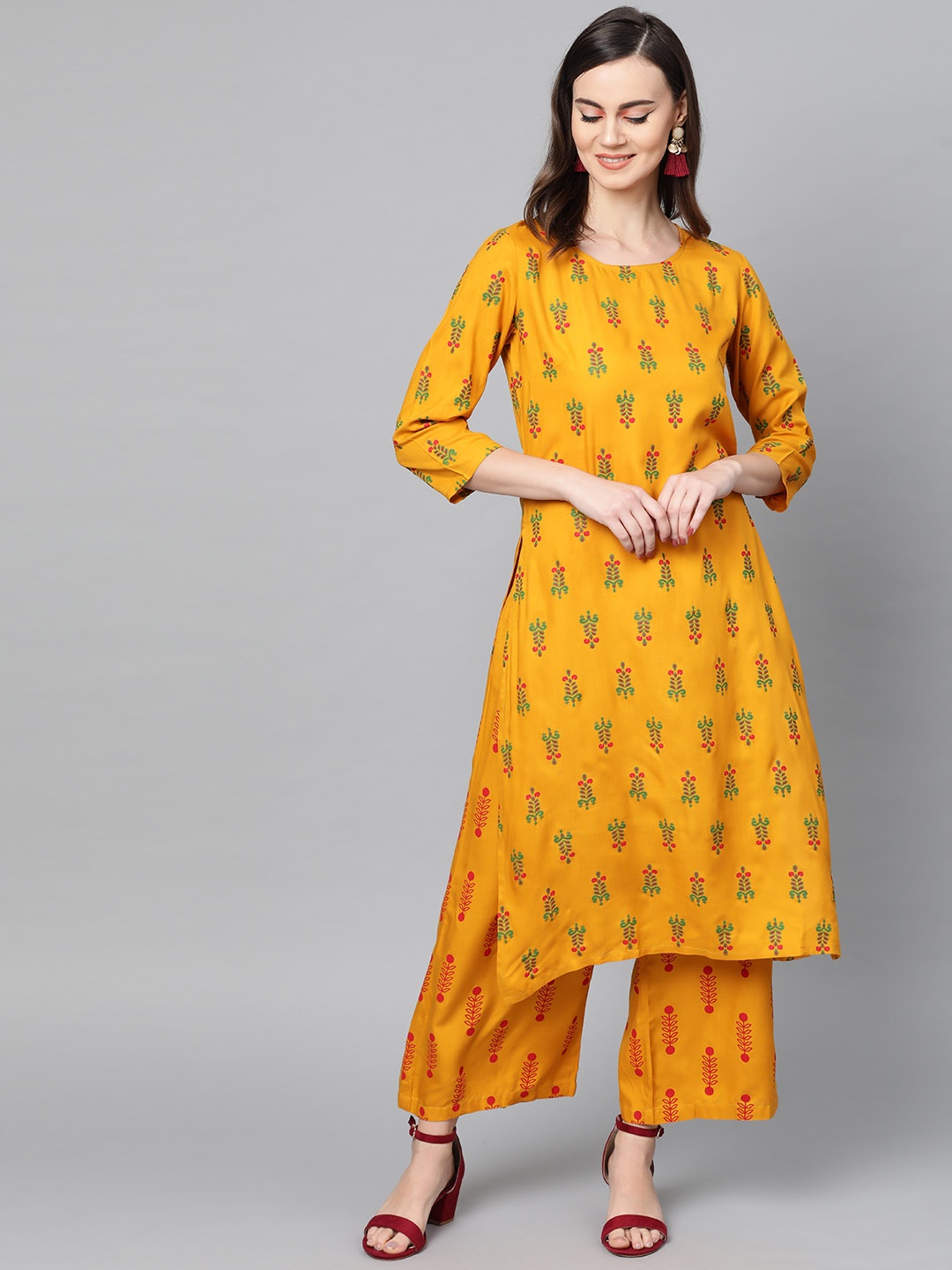 

Popnetic Women Mustard Yellow & Green Block Printed Kurta with Palazzos