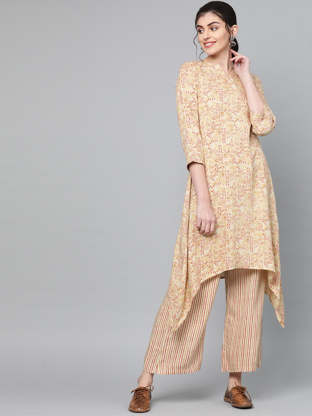 

Popnetic Women Beige & Red Printed Kurta with Palazzos