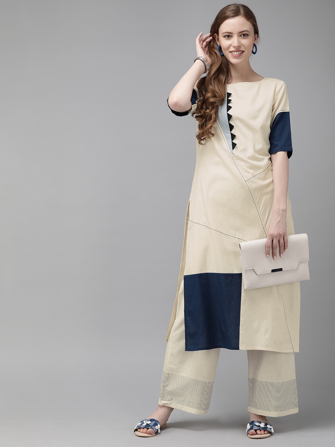 

Anouk Women Off-White & Navy Blue Colourblocked Straight Kurta