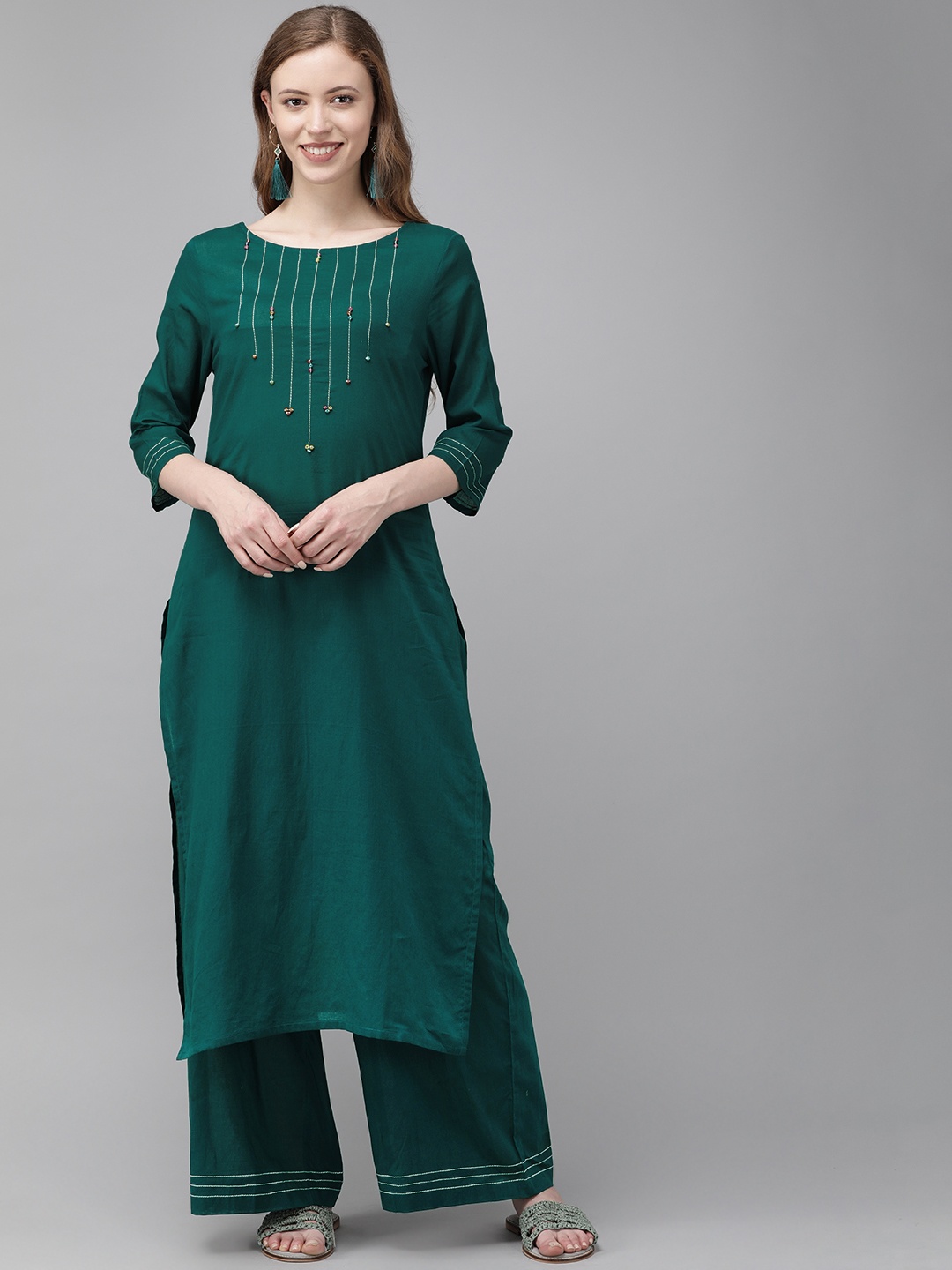 

Anouk Women Green Solid Kurta with Palazzos With Embroidered Detailing