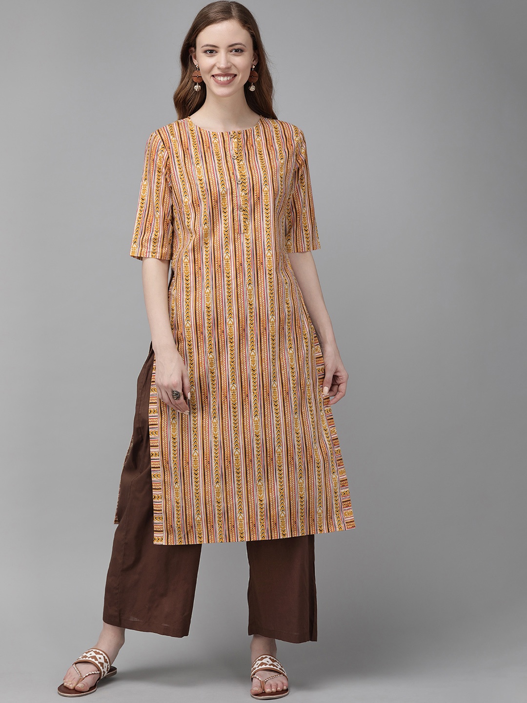 

Anouk Women Mustard Yellow & Brown Printed Kurta with Palazzos
