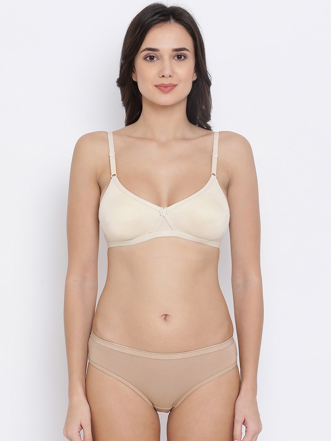 

Clovia Women Nude-Coloured & Cream-Coloured Solid Lingerie Set COMBBP38132B