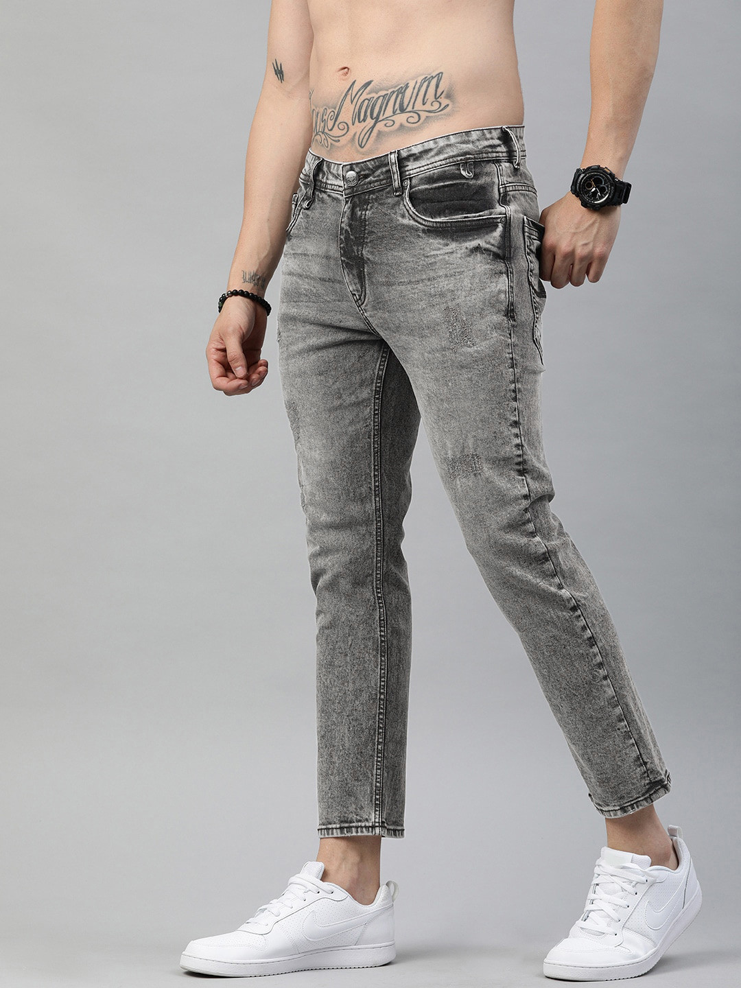 

The Roadster Lifestyle Co Men Black Skinny Fit Mid-Rise Low Distress Stretchable Jeans