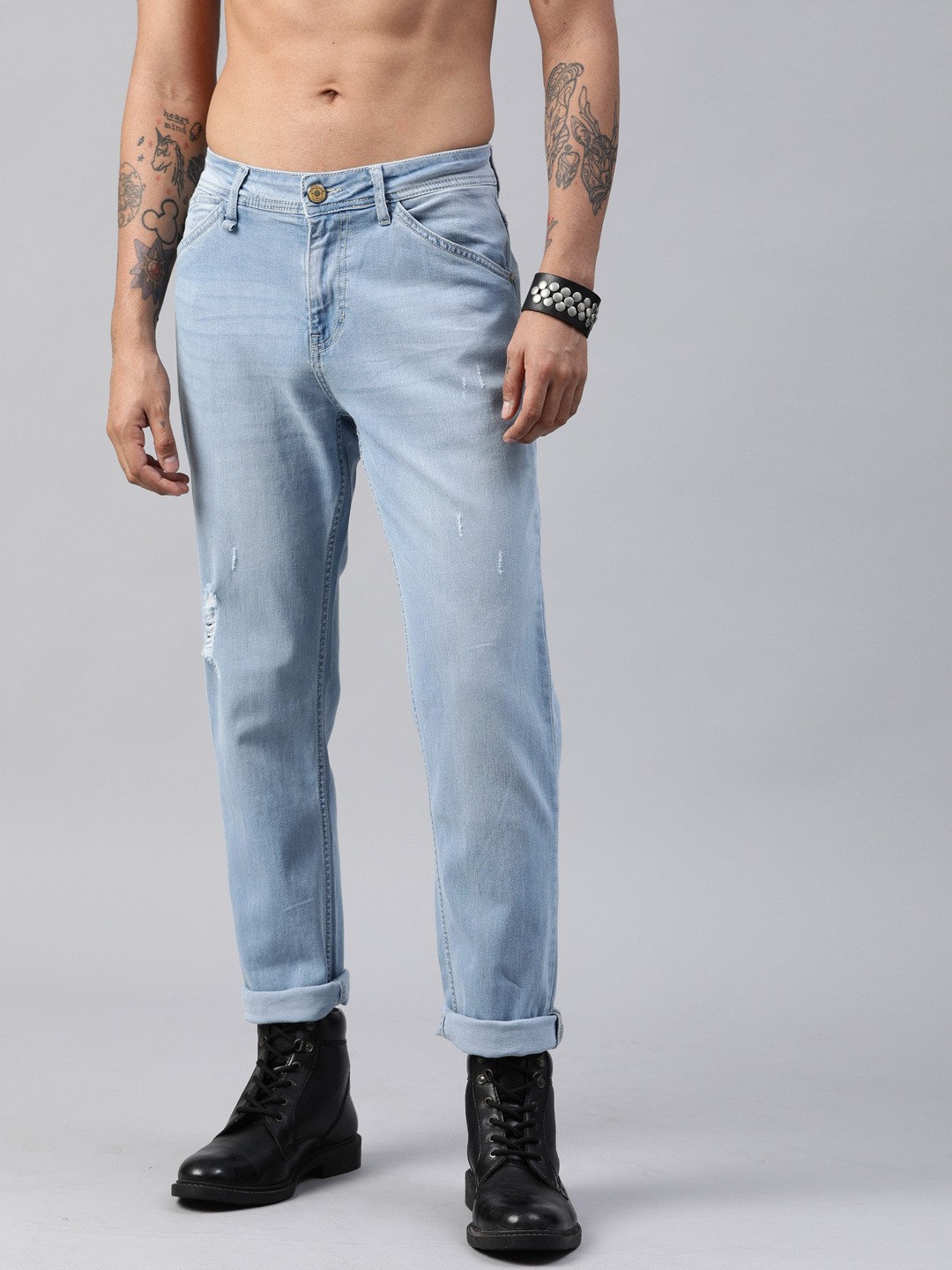 

The Roadster Lifestyle Co Men Blue Slim Fit Mid-Rise Low Distress Stretchable Jeans
