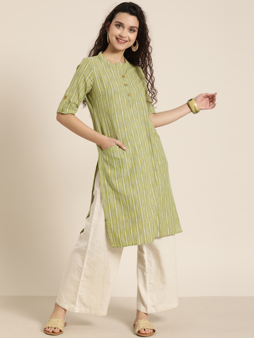 

Taavi Women Green Woven Design Woven Legacy Straight Kurta with Pockets