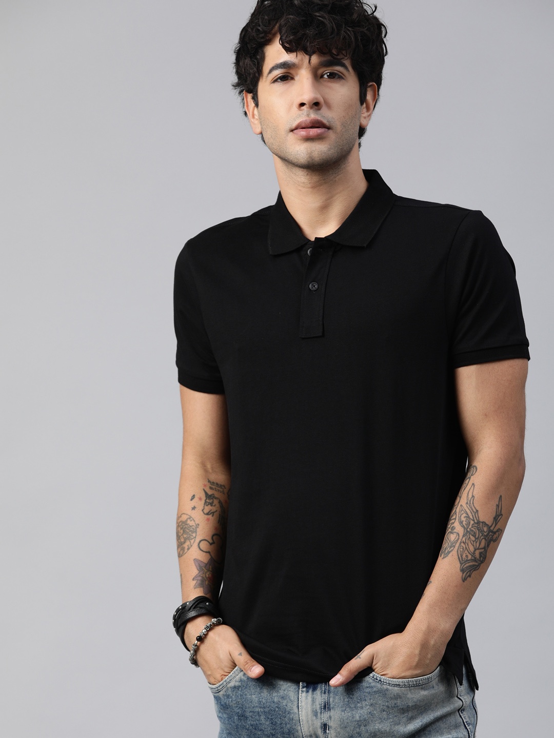 

The Roadster Lifestyle Co Men Black Polo Collar Cotton Pure Cotton T-shirt